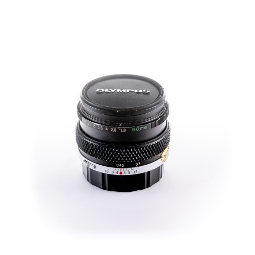 OLYMPUS F.ZUIKO 50mm f/1.8...