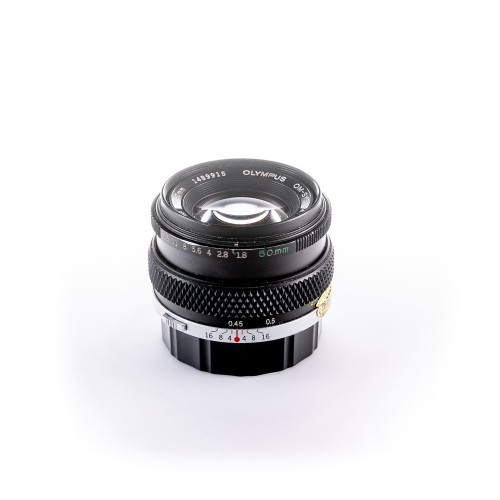 OLYMPUS F.ZUIKO 50mm f/1.8...